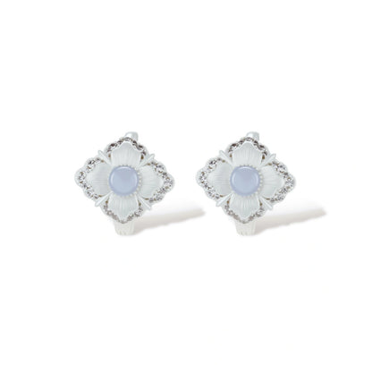 Fiora Mismatched Flower Earrings, close-up of zirconia quatrefoil border