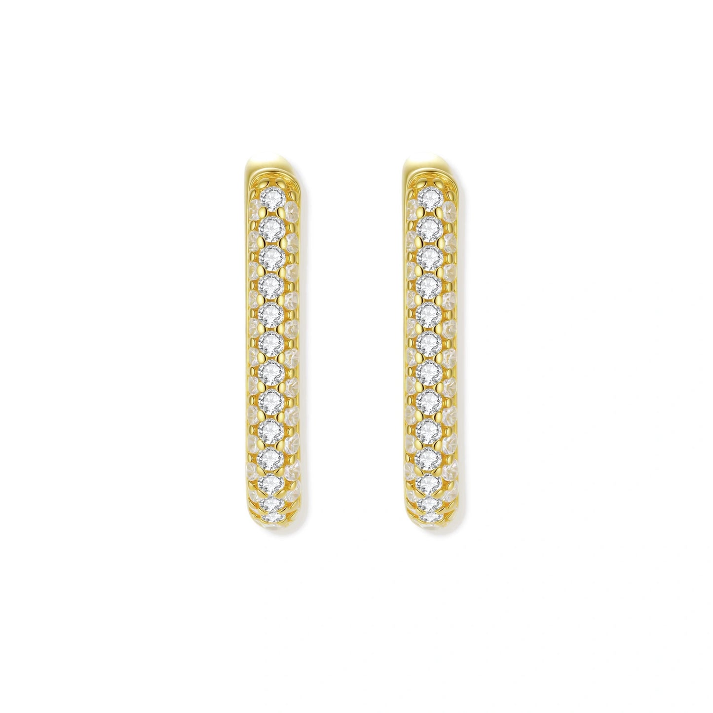 Gold hoop earrings with clear gemstones on a white background
