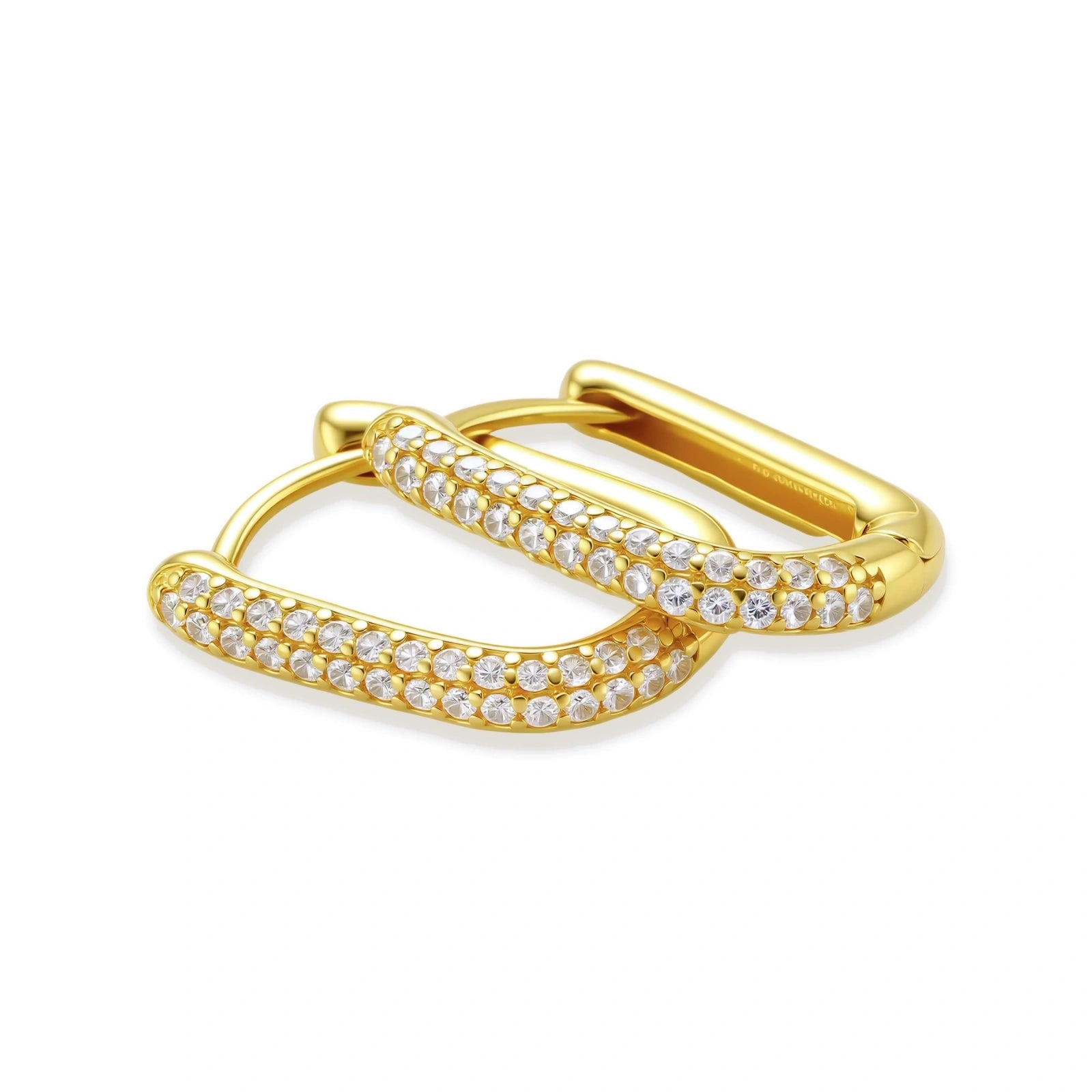 Gold earring with clear gemstones on a white background