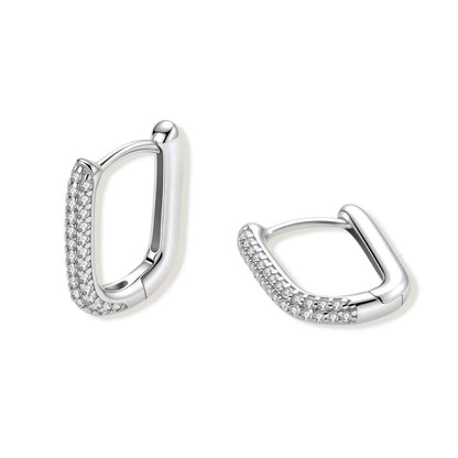 Pair of silver hoop earrings with small diamonds on a white background