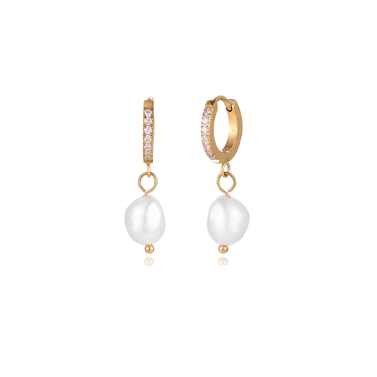 Gold hoop earrings with pearl drops on a white background