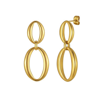 Gold hoop earrings on a white background