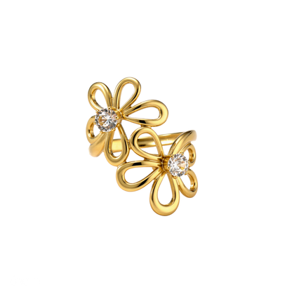 Gold flower-shaped ring with embedded diamonds on a white background