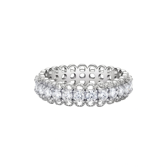 Silver ring with clear diamonds on a white background
