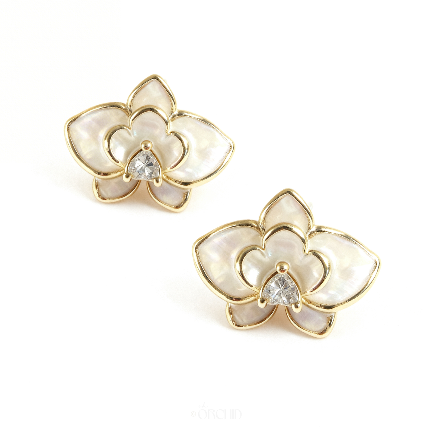 Pair of floral earrings with gold and pearl-like design on a white background
