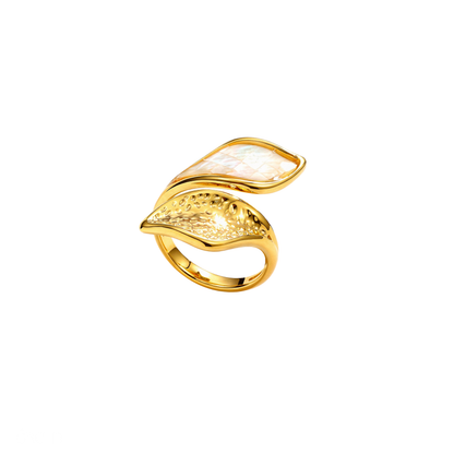 Gold leaf ring with a mother of pearl and textured design on a white background