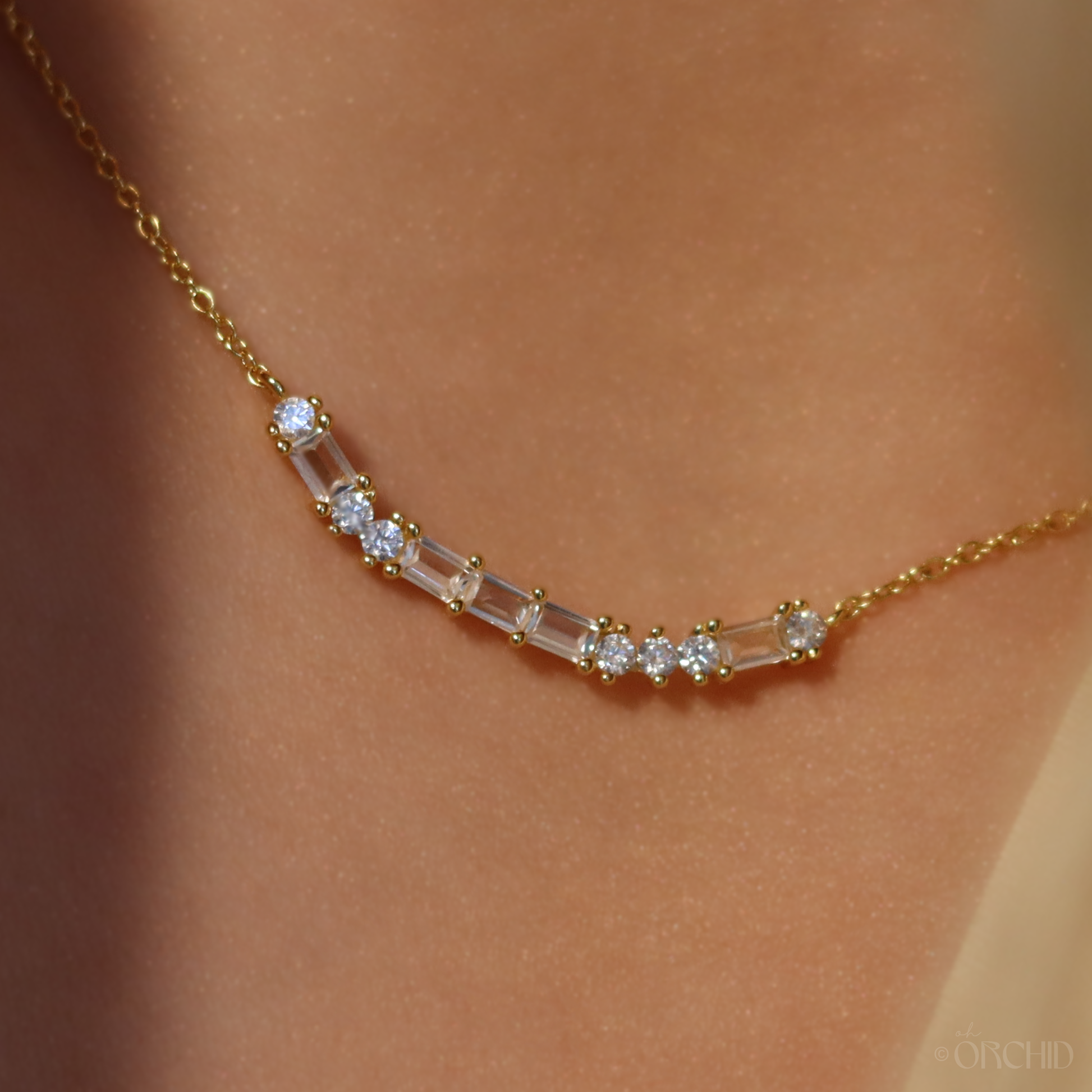 This necklace features a subtle Morse code design that spells out the word "Love".