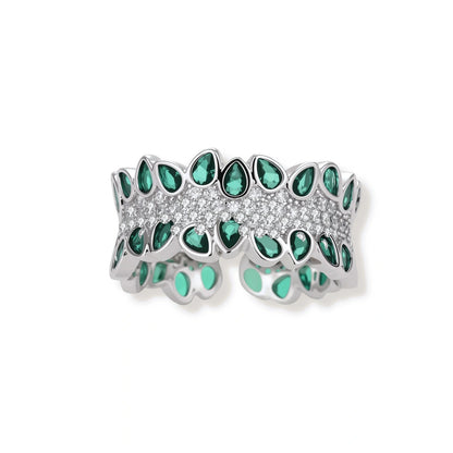 Verity Green Zirconia Ring, front view of the wide band edged with pear-cut green zirconia around a clear pavé row