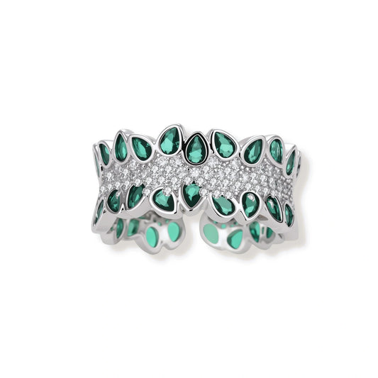 Verity Green Zirconia Ring, front view of the wide band edged with pear-cut green zirconia around a clear pavé row