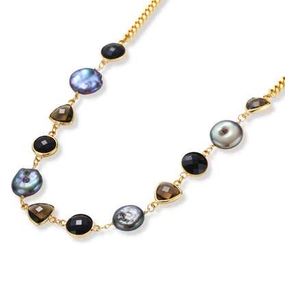 Delphine Baroque Statement Necklace, angled view showing the bezel-set mixed stations