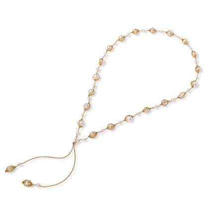 Golden Pearl Lariat Y-drop detail with lantern-caged pearls