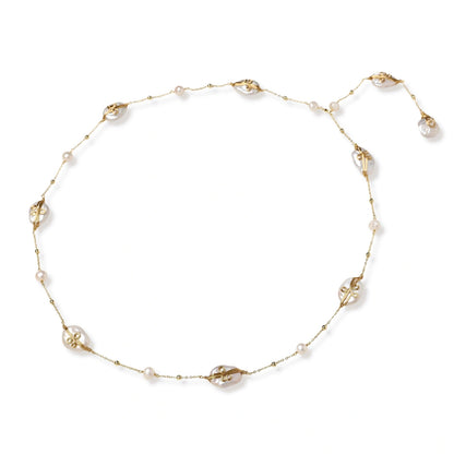 Rosalind Baroque Pearl Necklace, close-up of a baroque pearl station with wirework detail