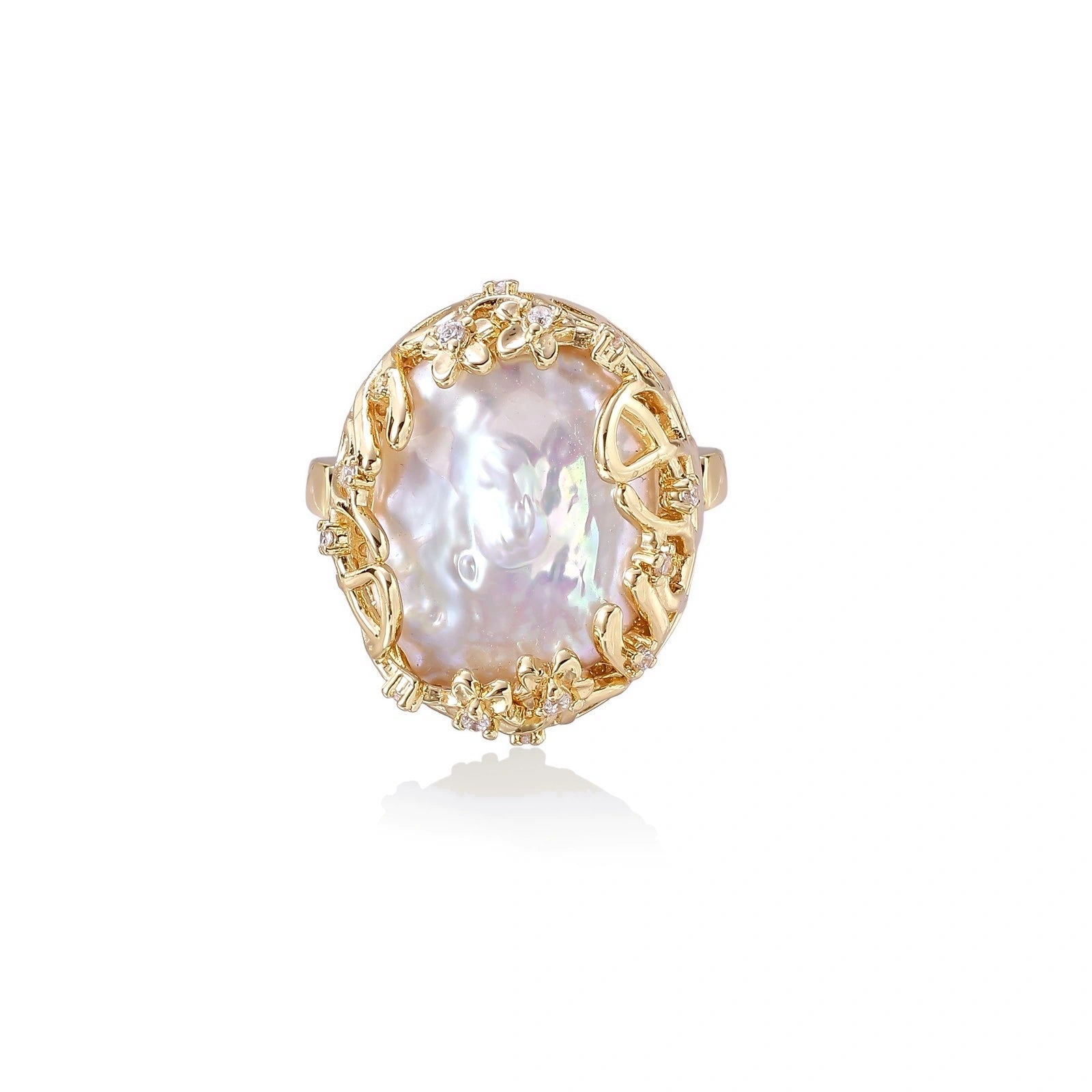 Gold ring with a large pearl stone on a white background