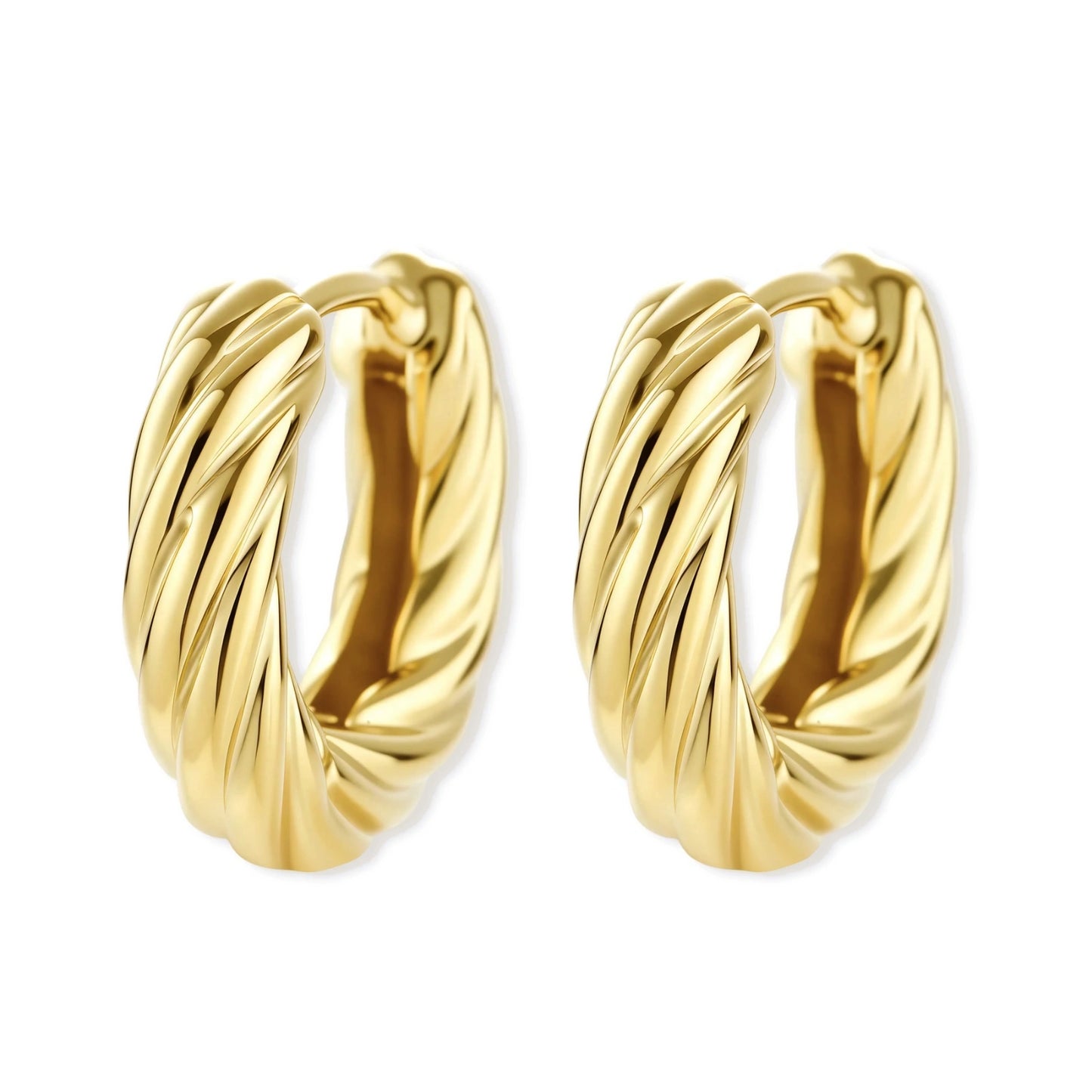 twisted gold huggie hoops on a white background