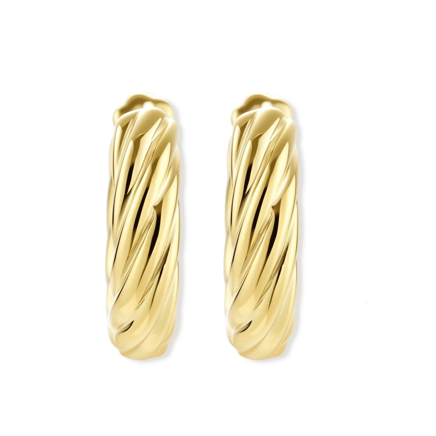 twisted gold huggie hoops on a white background