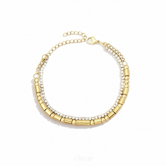 Gold morse code beaded tennis bracelet design on a white background
