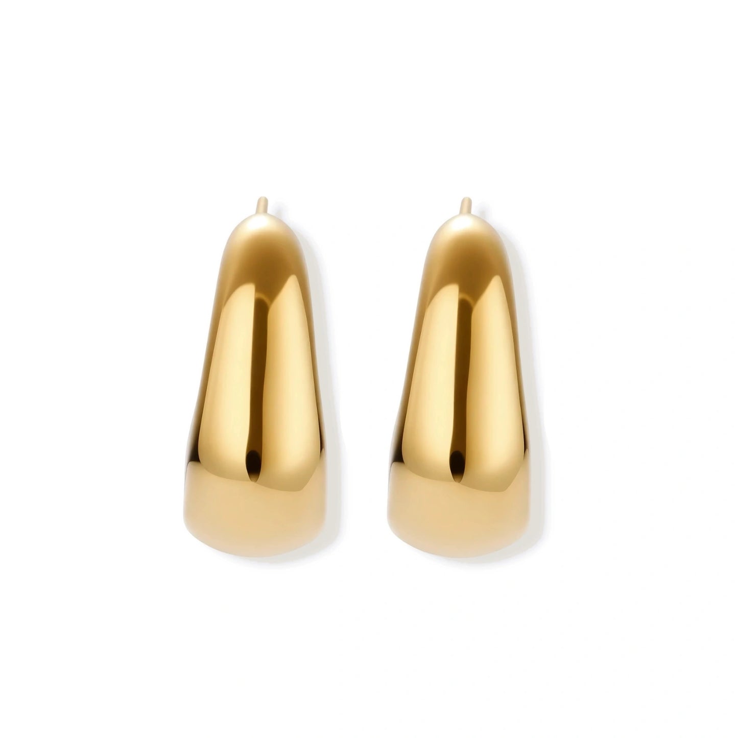 Pair of gold earrings on a white background