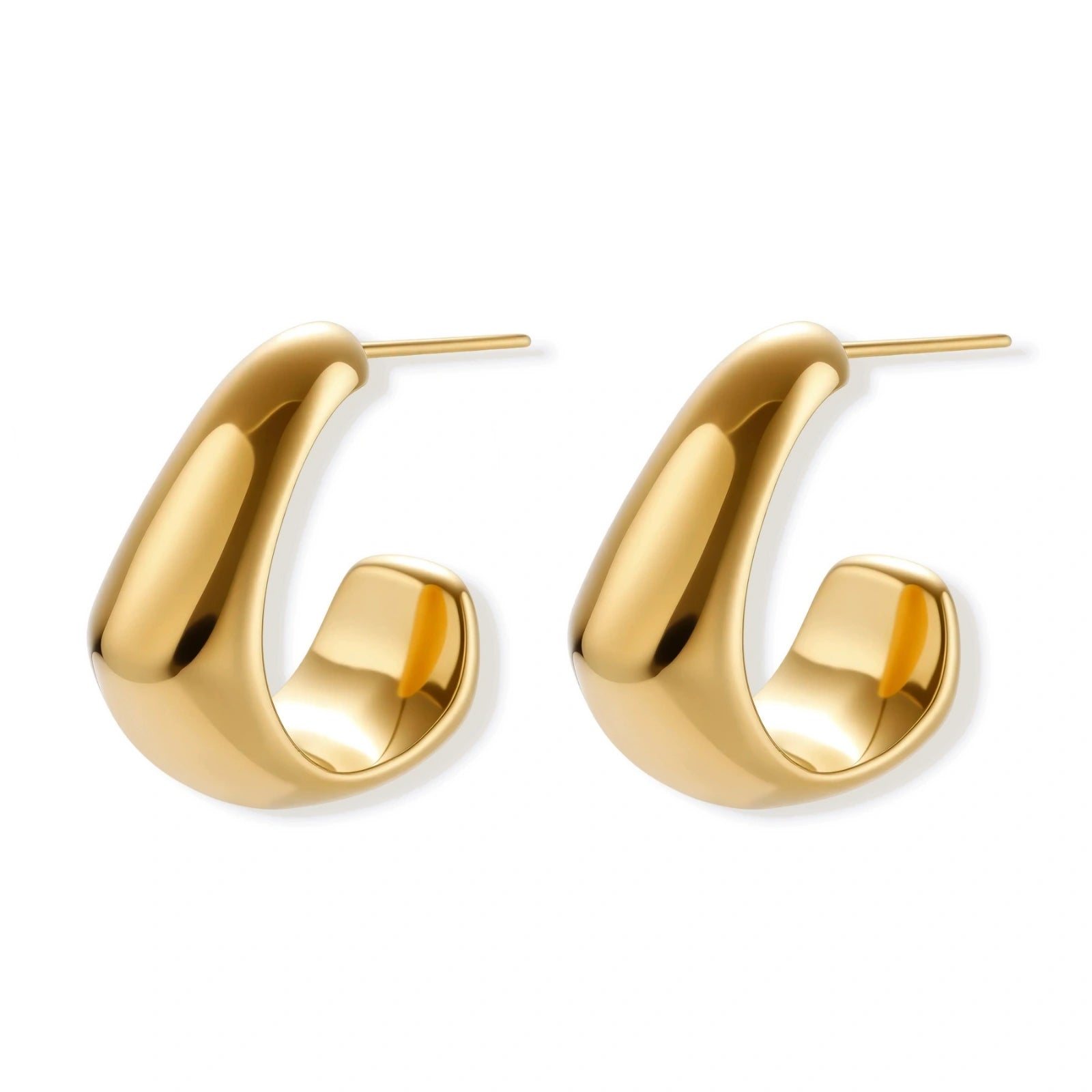 Gold hoop earrings on a white background